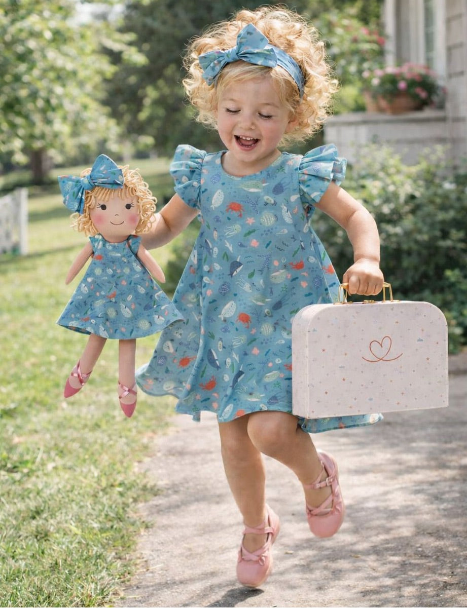 Annie cloth doll with her Petit Case keepsake suitcase